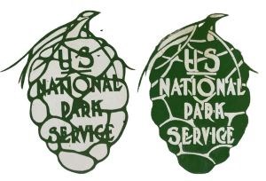 white and green US National Park Service sequoia cone emblems