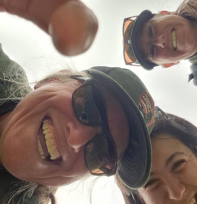 A close-up face looking down into the camera.