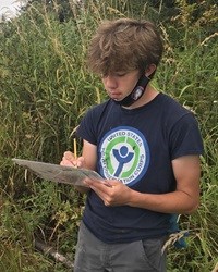 Adam Peschl taking field notes.