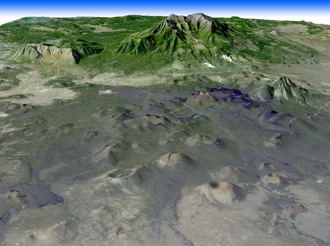 3d image of a volcanic landscape with lava flows in the foreground and peaks in the distance
