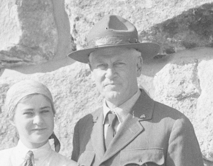 Man and woman. Man has flat hat with hatband.