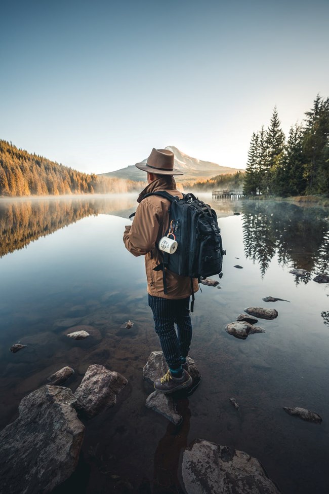 man standing in river