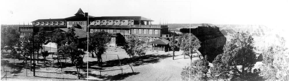 Large two-story hotel in the style of a hunting lodge: log walls, on the rim of Grand Canyon.