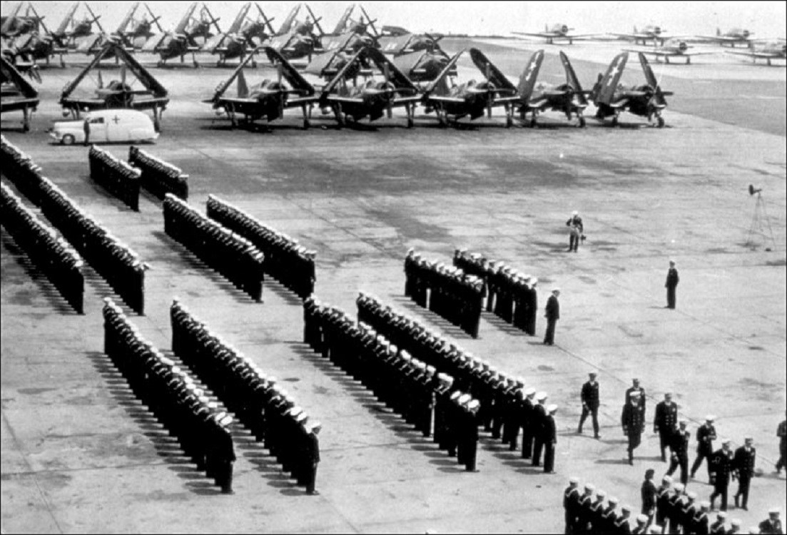 Inspection of ferry squadrons, with uniformed men standing in straight rows, NAS New York, c. 1944.