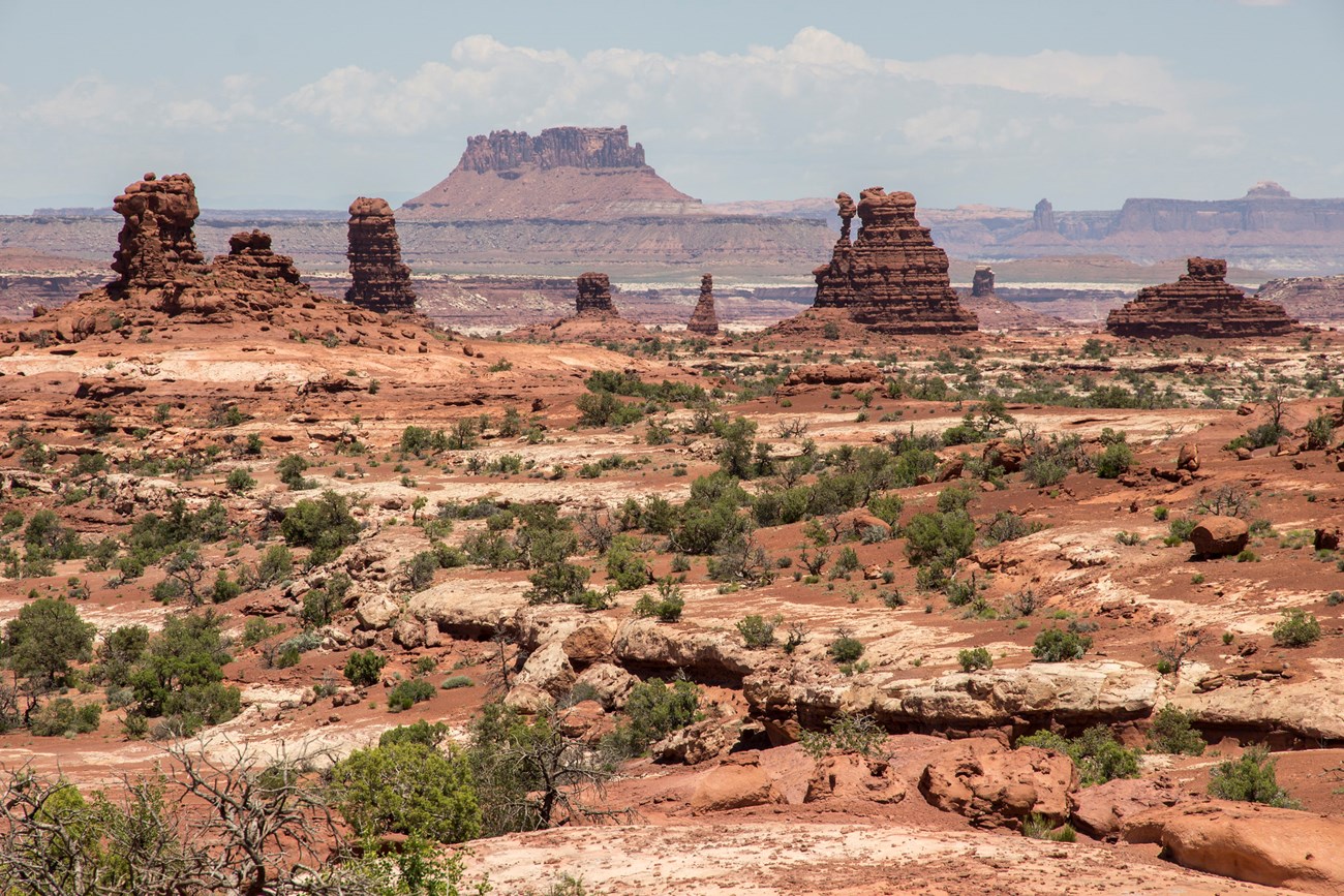 Photo of a redrock desert landscape with rock spires