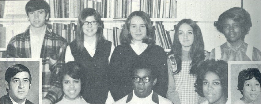 Eight high school students and two teachers. Some of them are black and some of them are white.