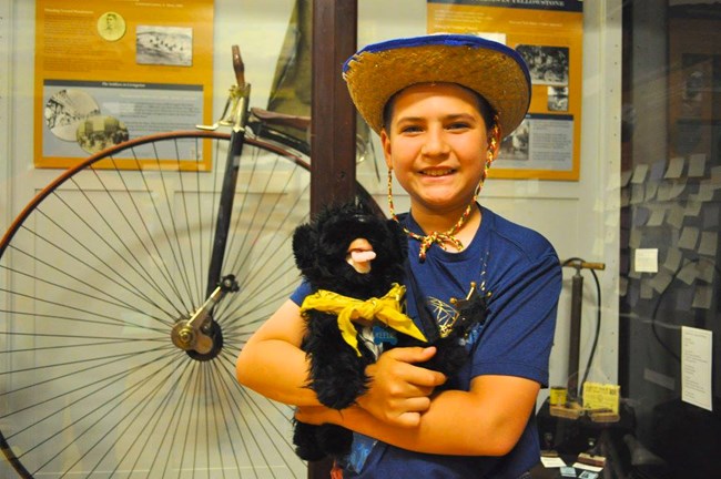 boy with toy dog