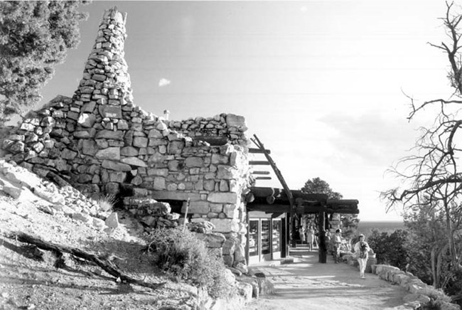 Rugged stone building built on the rim of Grand Canyon.