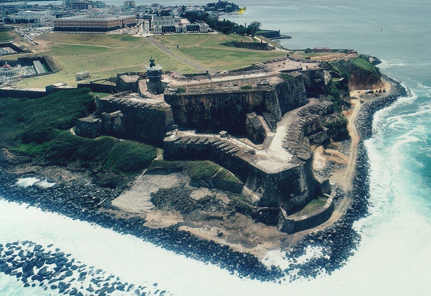 Aerial of fortification by ocean.