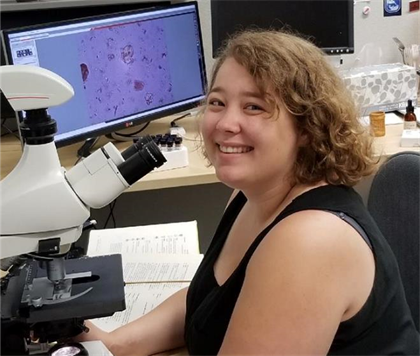 Barrie Chileen at the microscope