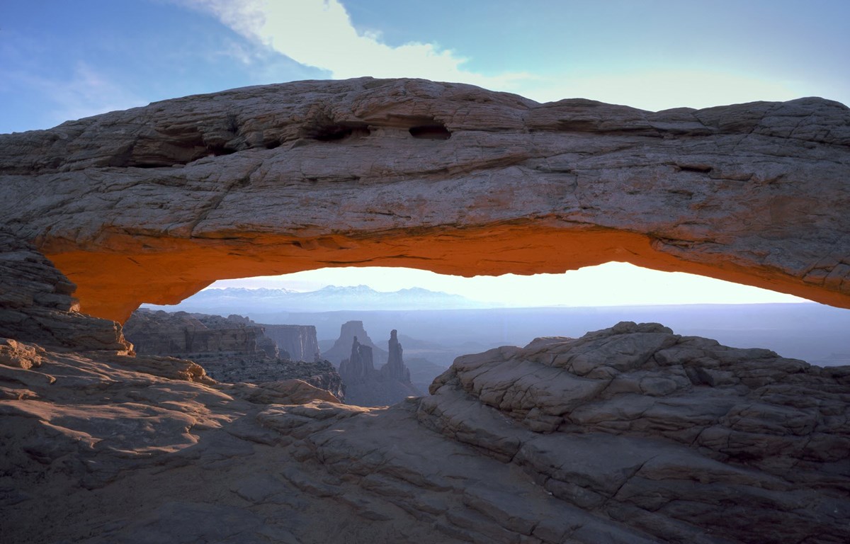 Canyonlands and the La Sal Mountains seen through a natural arch