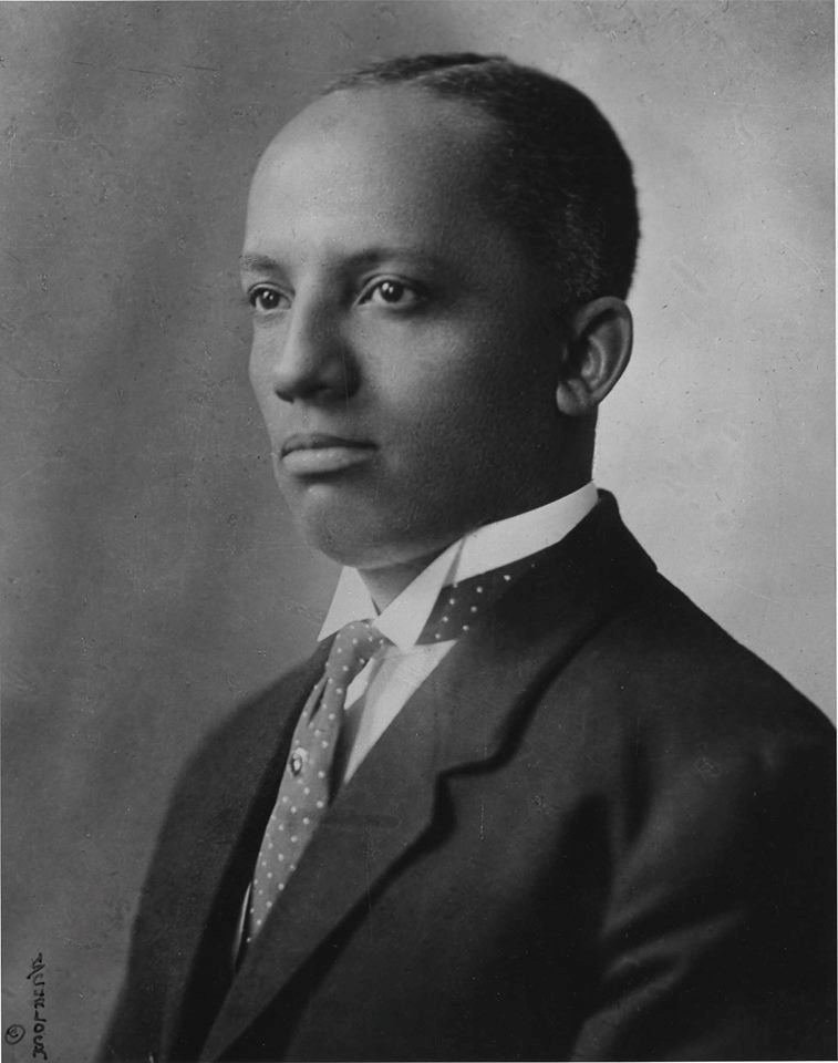 Black and white portrait of young Carter G Woodson