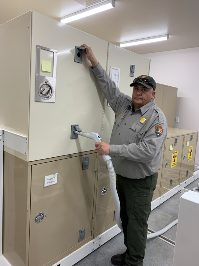 Eric Herrera working in the office