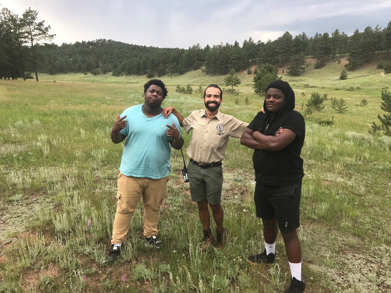 Hip Hop artists Joey (left) and Nehemiah (right) and GIP Intern Kevin Jauregui (middle) finding inspiration at Florissant Fossil Beds.