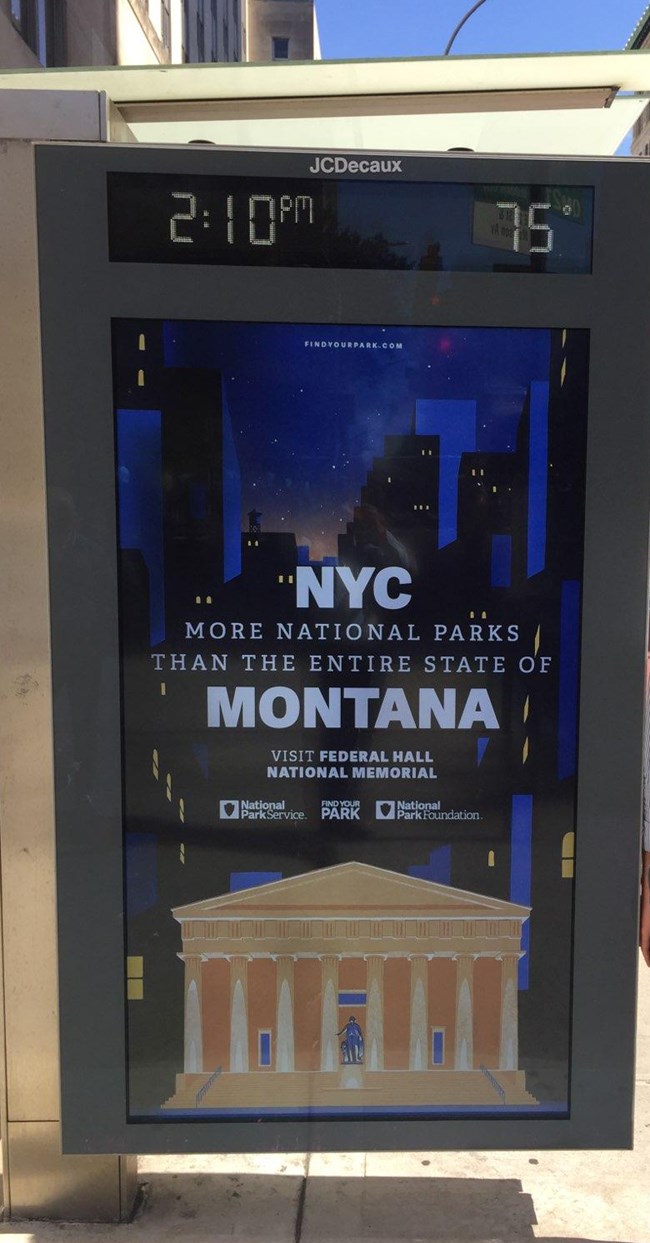 a display ad on the side of a bus shelter