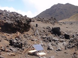 Equipment set up in a dry rocky mountainous area.