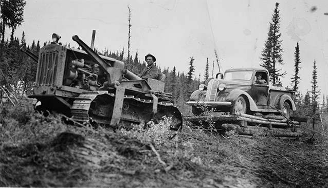 A Caterpillar “Diesel Forty” pulling a Dodge truck on skids to Coal Creek mining camp, ca. 1936.  University of Alaska Fairbanks, Stanton Patty Family Papers (2012-93-80)