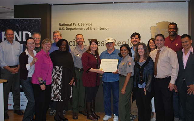 National Park staff present an award to Phil Valdez at the Pacific West Regional Office. 