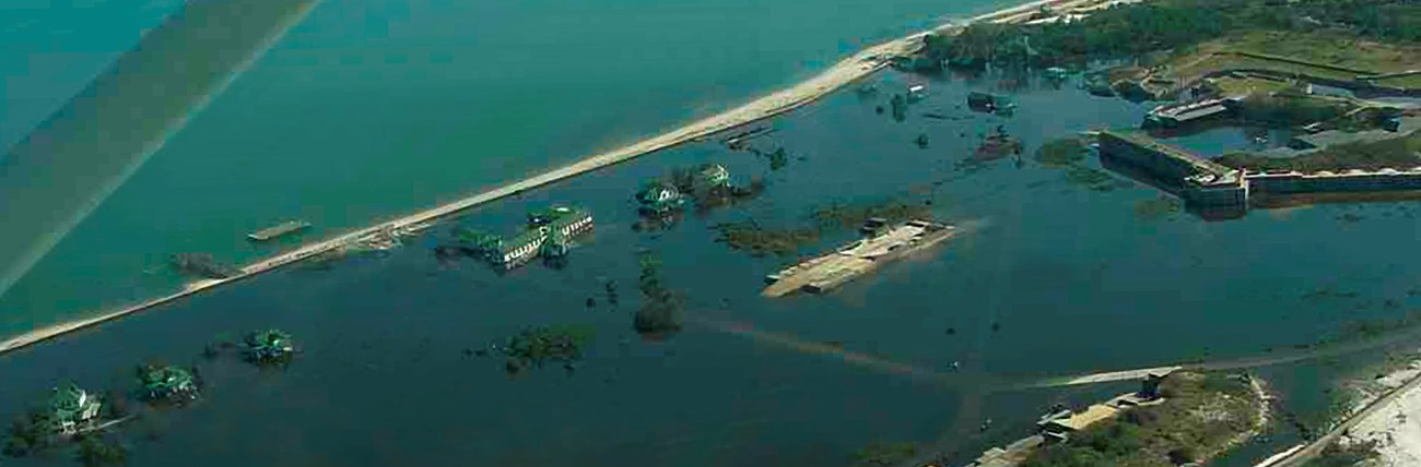 Aerial photo showing flood waters within the Fort Pickens historic district