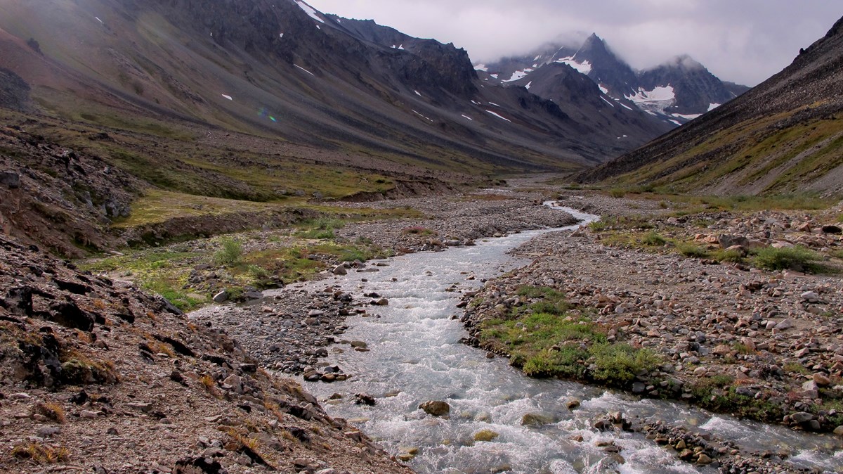 A river winds through a rocky valley