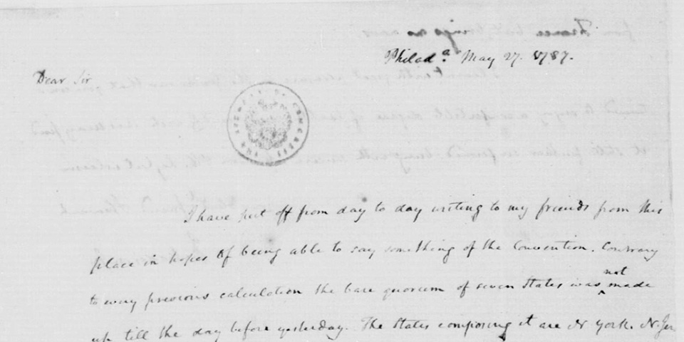 Color image of the top half of a letter showing brown ink on cream colored paper.