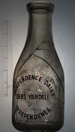 Bottle embossed with Independence Dairy Debs Yandell Independence