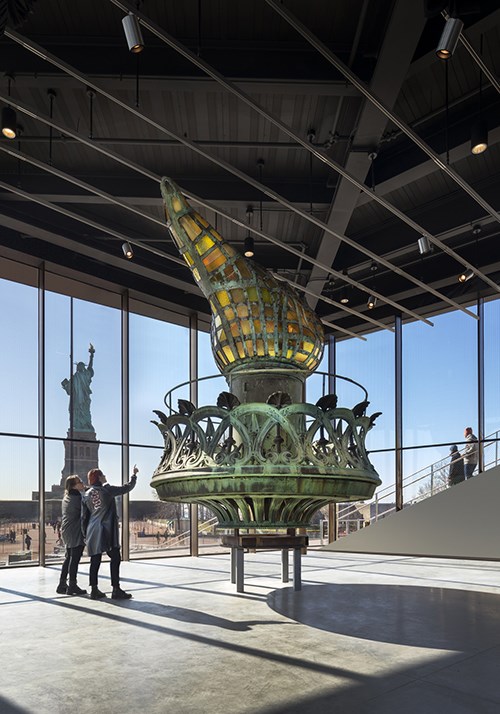 The original torch of the Statue of Liberty stands on exhibit.