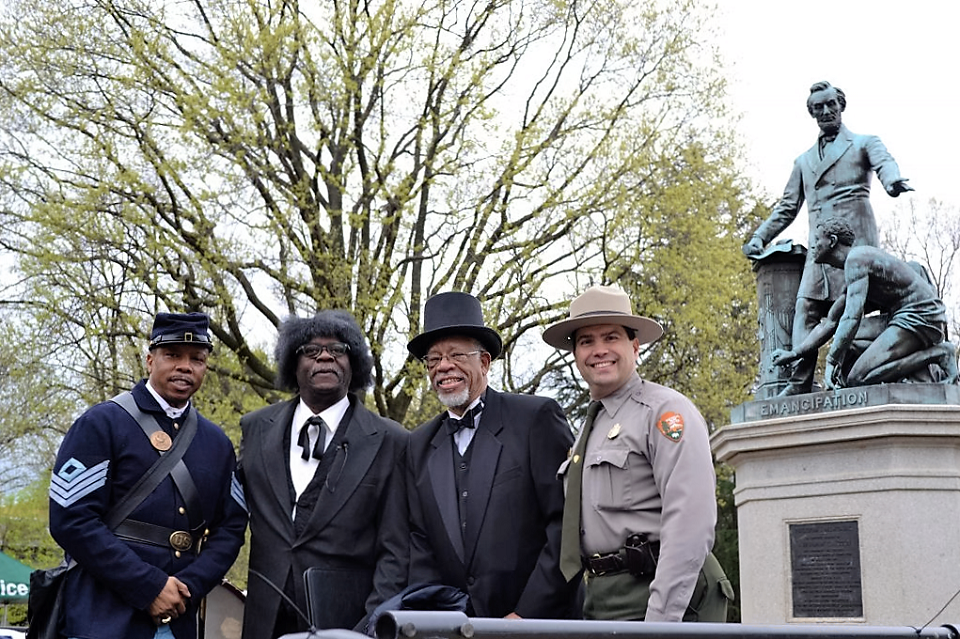 Ranger at the Bicentennial Commemoration of Fredrick Douglas in front of statue