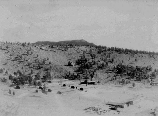 Campsite at the bottom of a hill