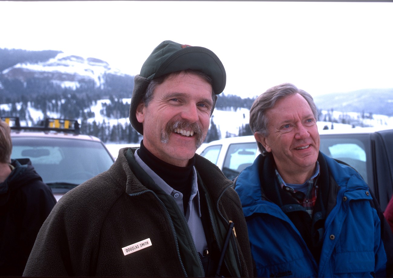 Douglas W. Smith and Bruce Babbit watch wolves