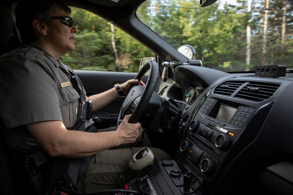Ranger inside her patrol vehicle