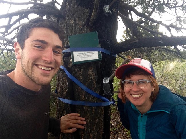 Portrait of acoustic biologists Trent Hawkins and Rachel Buxton