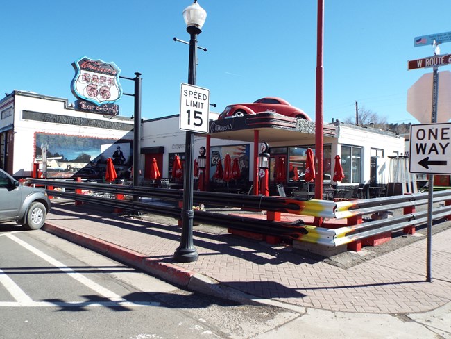 The Old Mobil Gas Station (now Cruiser’s Route 66 Café) - was built in 1930 and is located at 233 W Route 66 in Williams, Arizona. Photo By Marine 69-71, CC BY-SA 4.0, https://commons.wikimedia.org/w/index.php?curid=76276572