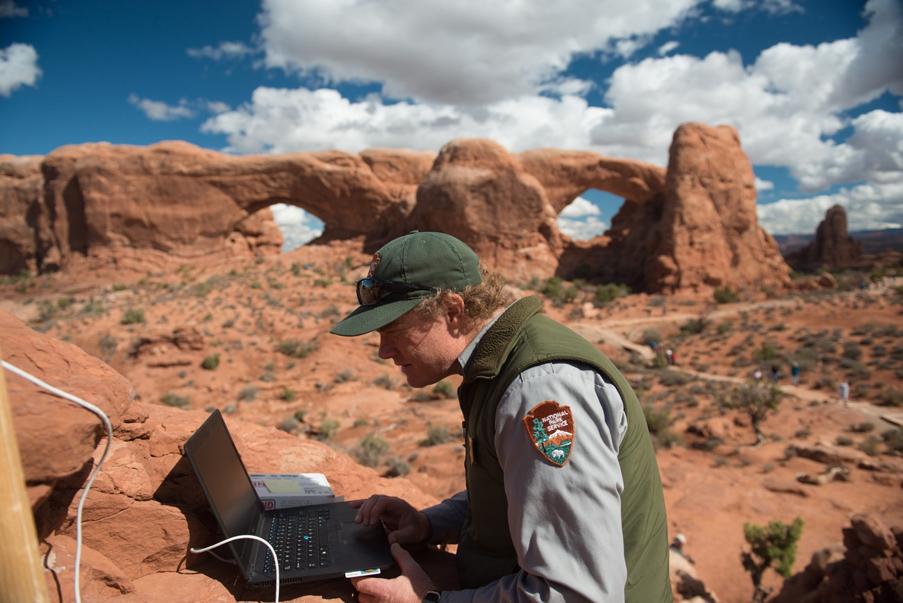 Park scientist collects data from Crackmeter