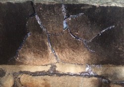 close of up granite with apoxy in cracks