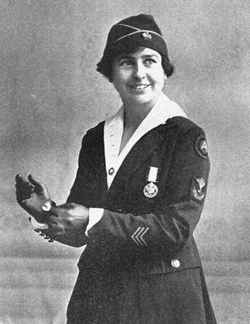 Woman in military service uniform.