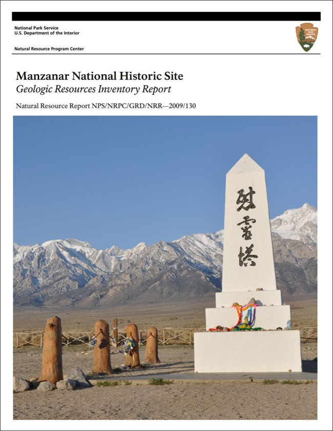 image of manznar gri report cover with image of monument and mountains