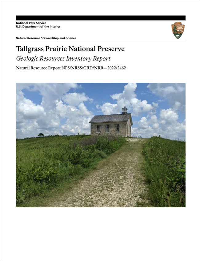 image of report cover with photo of a small building and a gravel pathway in a grassy field.