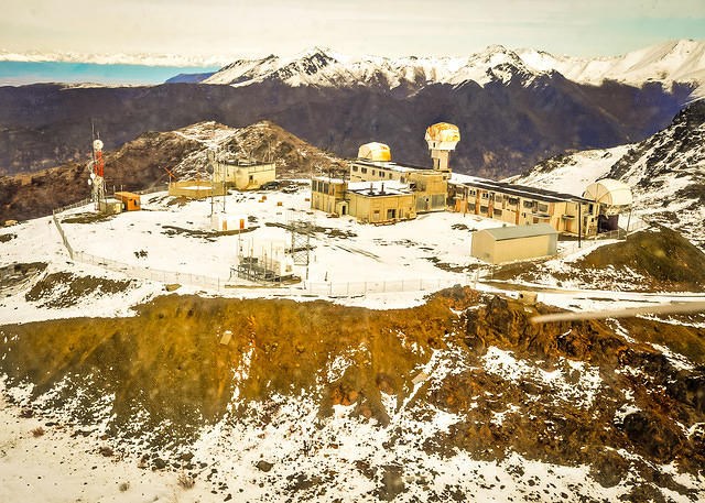 Defense site in snow covered mountains. (Photo by Laura Turner, courtesy of the U.S. Air Force)