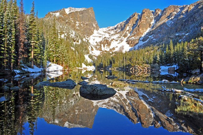 Hallett Peak reflected in the water of Dream Lake in Rocky Mountain NP