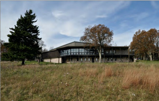 View of the visitor center, a modern wood building at Big Meadows