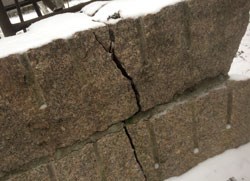 a large crack running vertically through granite slab