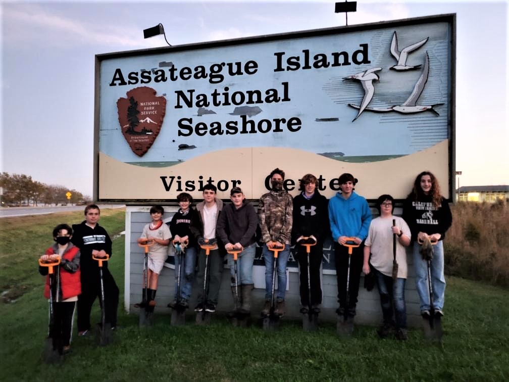Boy Scout Troop 225 in front of the Assateague Island National Seashore sign