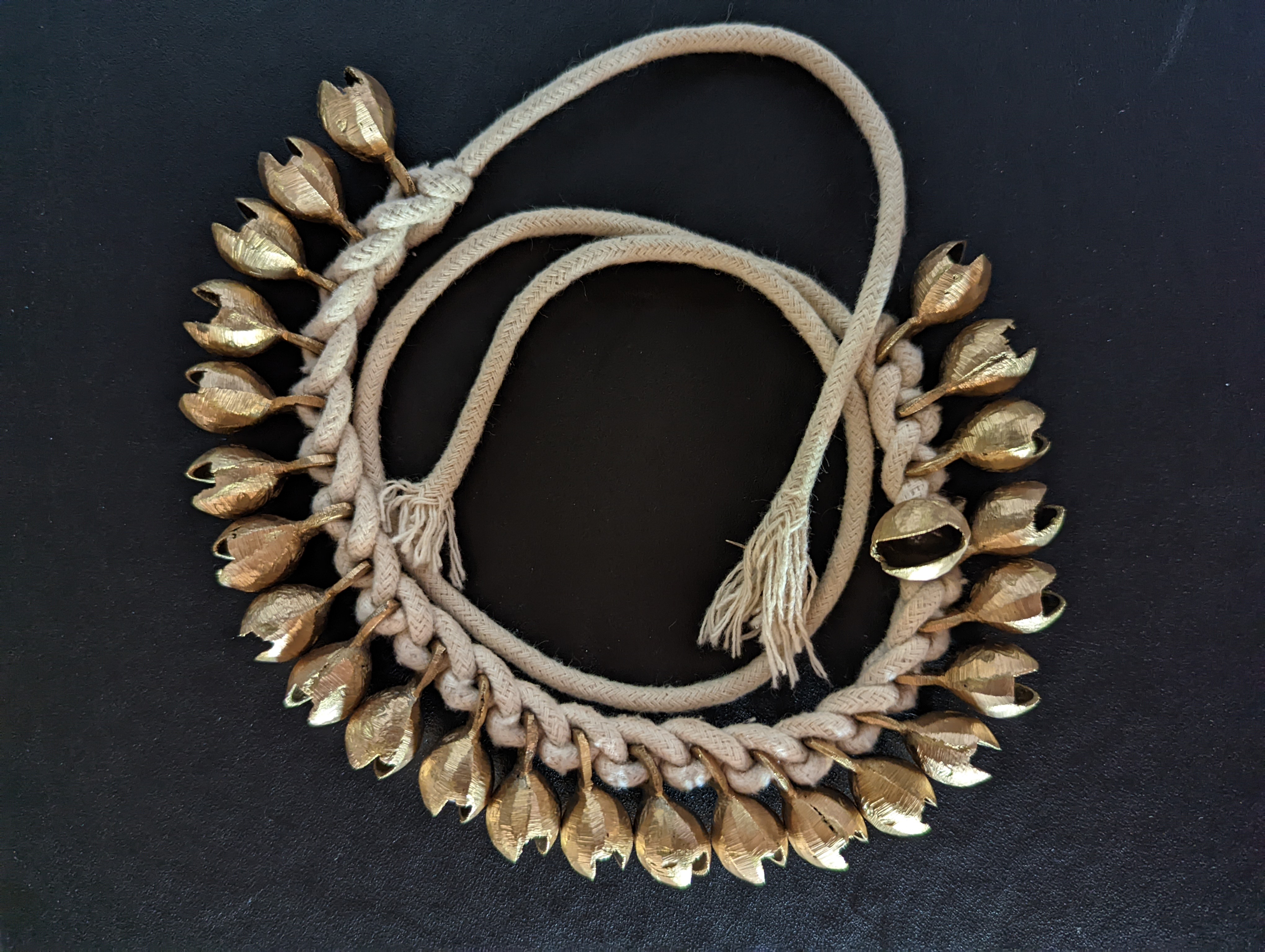 A replica of an ancestral Pueblo shaker with copper bells, from the ArcKart exhibit in the AZRU visitor center. The bells would have been imported from what is now Mexico.