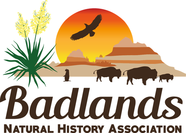 Colorful logo with badlands, bison, prairie dog, yucca, and eagle.