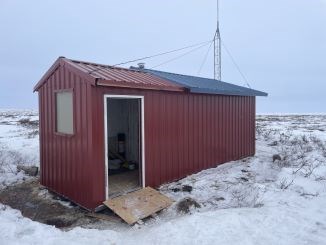 red cabin on tundra