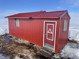 red cabin on tundra