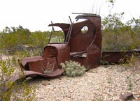 Old car rusting in the desert