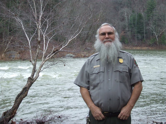 Steve Bakaletz standing by river
