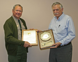 Ron Cornelius receives award for 40 years of Federal service.
